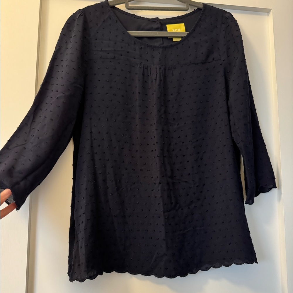 Anthropologie’s Maeve Navy Textured Blouse